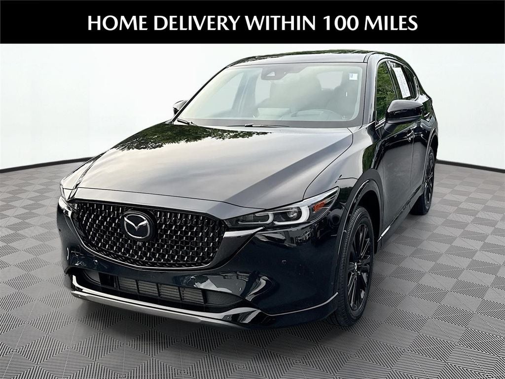 2025 Mazda Mazda CX-5 2.5 Turbo Premium in Jet Black Mica — front three-quarter view