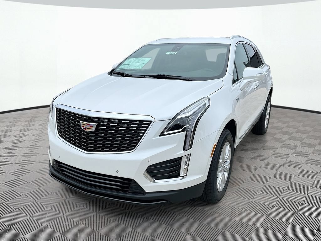 2026 Cadillac XT5 Luxury in Crystal White Tricoat — front three-quarter view