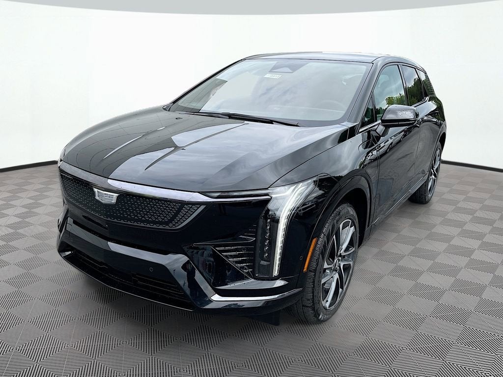 2026 Cadillac OPTIQ Sport in Black Raven — front three-quarter view